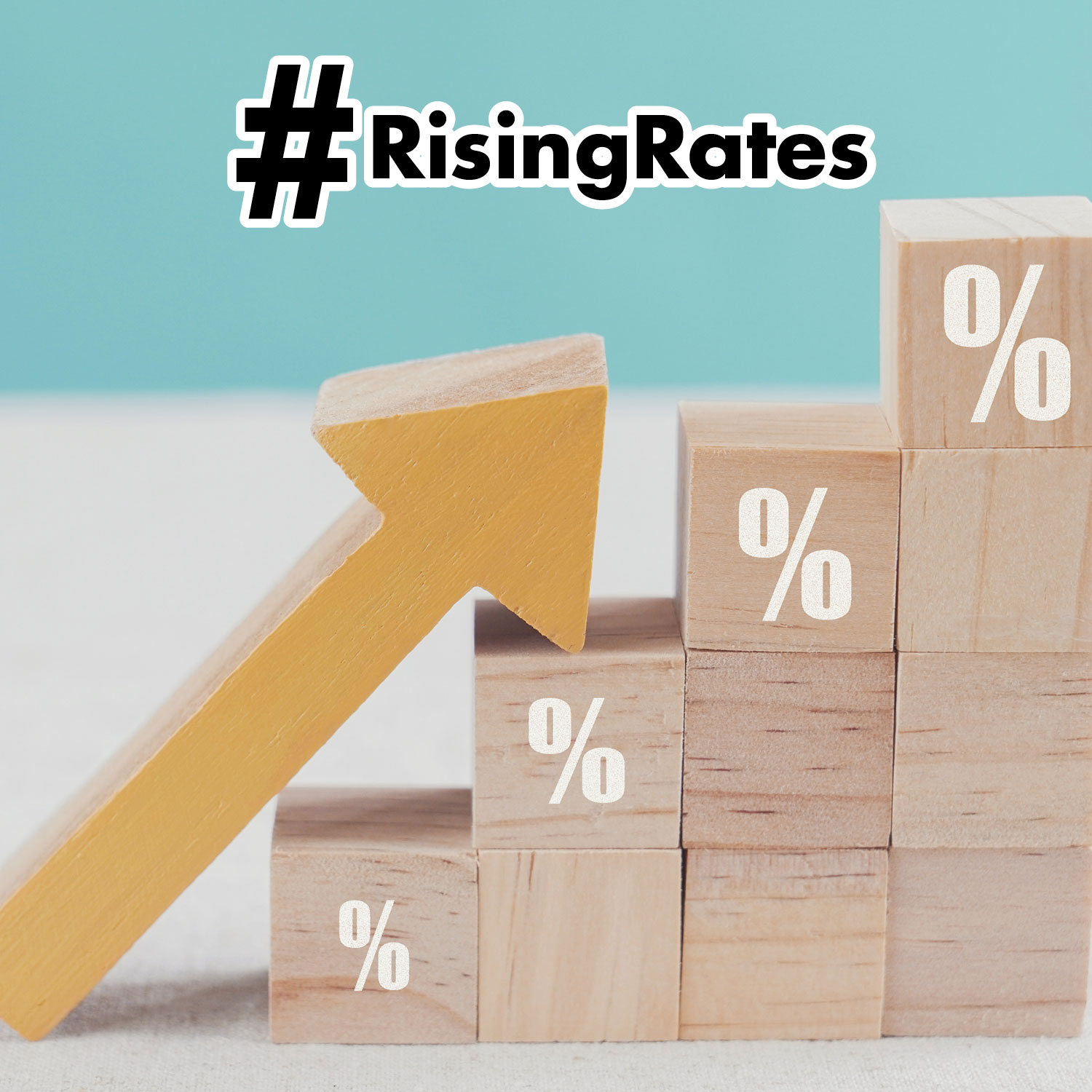 Blocks making steps with percentage signs on them and an arrow laying against the steps going upward indicating Rising Interest Rates