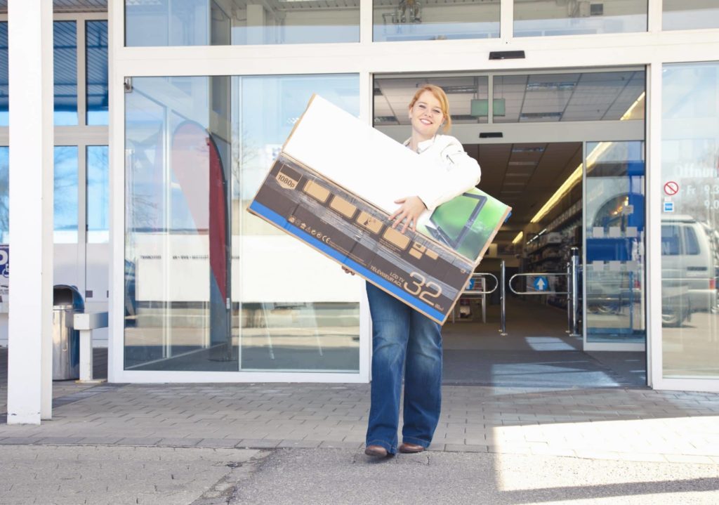 Woman buying a television
