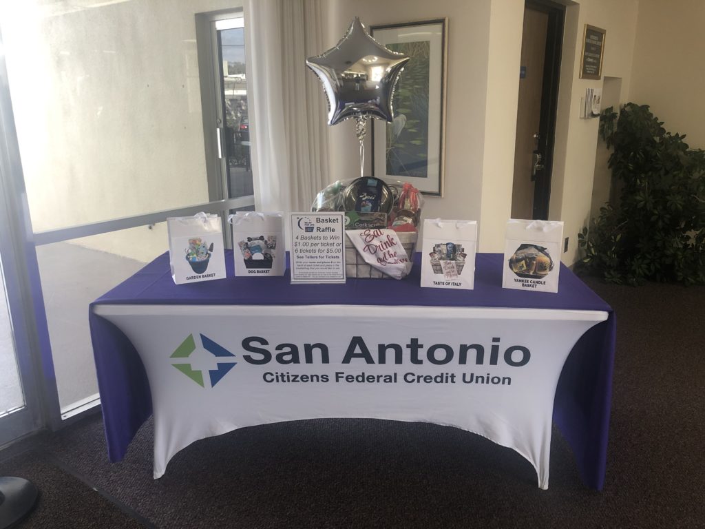 Picture of the raffle table that is in the Dade City office lobby.