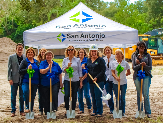 Photo of SACFCU Employees holding shovels at the groundbreaking ceremony of the new San Antonio Operations Center