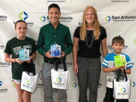 Picture of SACFCU's Office Manager and Youth Month Contest Winners. Each of the 3 winners won a Fujifilm Instax Camera with accessories!